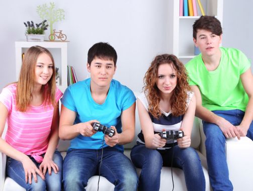 Teens playing video games, does it make them smart 